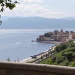 ALT: "Cibo italiano come souvenir estivo 2025: spese alimentari e tradizioni culinarie."