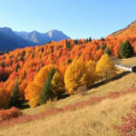 "Paesaggio autunnale dell'Alto Adige con colori vibranti del foliage e panorami incantevoli."