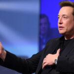 "Elon Musk avverte sui rischi futuri dell'AI: previsioni preoccupanti per il 2027."