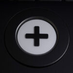 ALT: "Simbolo + nel cerchio: significato e impatto sul tuo telefono."